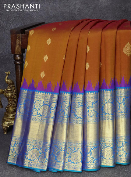 Pure gadwal silk saree dark mustard and dual shade of bluish green with allover zari woven buttas and temple design long floral zari woven border - {{ collection.title }} by Prashanti Sarees