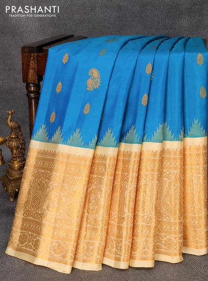 Pure gadwal silk saree dual shade of teal blue and cream with zari woven buttas and temple design long zari woven border - {{ collection.title }} by Prashanti Sarees