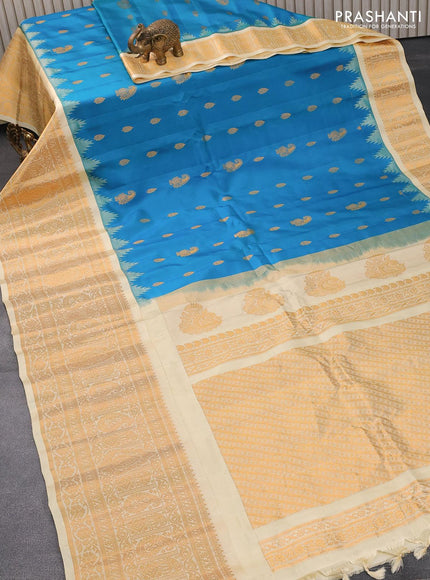 Pure gadwal silk saree dual shade of teal blue and cream with zari woven buttas and temple design long zari woven border - {{ collection.title }} by Prashanti Sarees