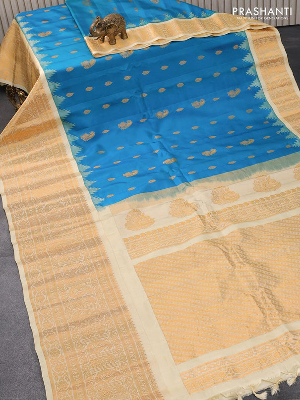 Pure gadwal silk saree dual shade of teal blue and cream with zari woven buttas and temple design long zari woven border - {{ collection.title }} by Prashanti Sarees