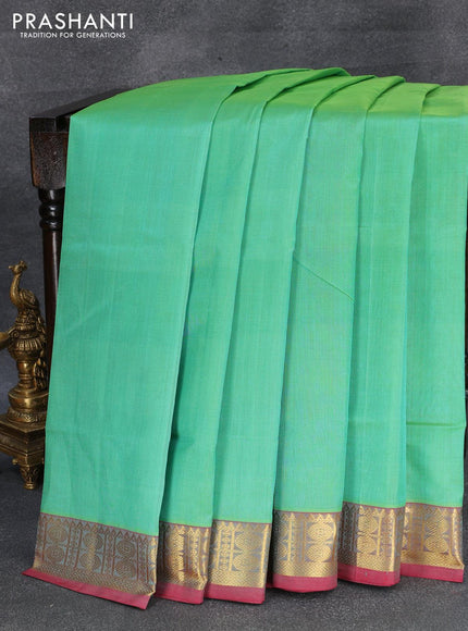 Silk cotton saree dual shade of teal green and red with plain body and zari woven border - {{ collection.title }} by Prashanti Sarees