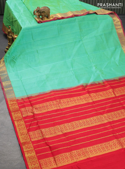 Silk cotton saree dual shade of teal green and red with plain body and zari woven border - {{ collection.title }} by Prashanti Sarees