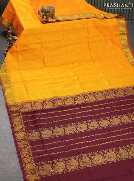 Silk cotton saree dual shade of yellwoush orange and deep maroon with plain body and annam zari woven border - {{ collection.title }} by Prashanti Sarees