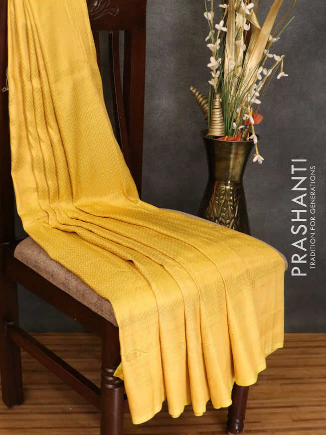 Banarasi semi silk saree yellow with allover zari weaves and zari woven border