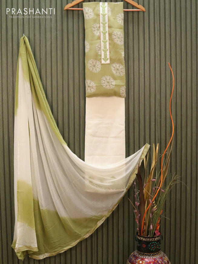 Slub cotton dress material pastel green and off white with allover prints & embroided neck pattern and chiffon dupatta