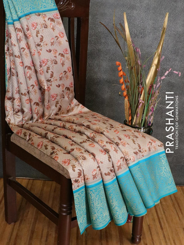 Malai silk saree chikku shade and blue shade with allover self emboss floral prints and paisley zari woven border - {{ collection.title }} by Prashanti Sarees