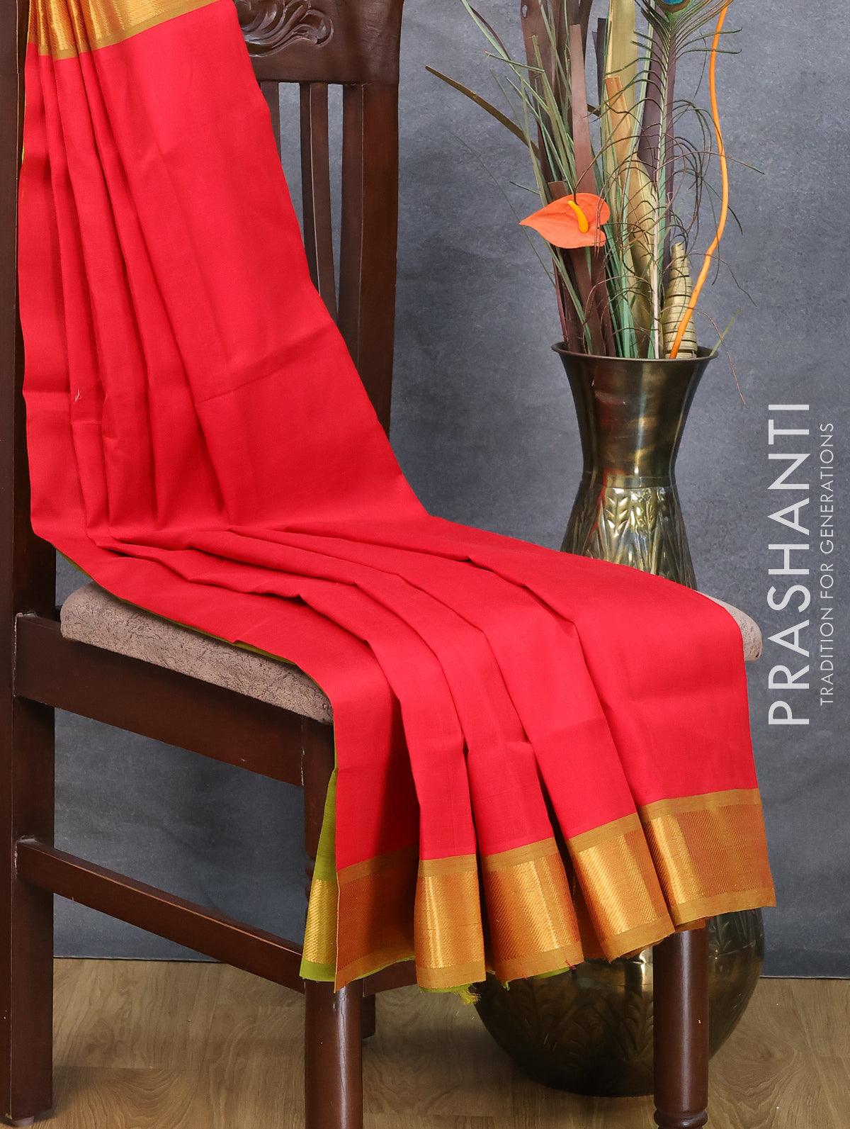 Turquoise semi-silk cotton saree with unique buttas on its body,  self-border & pallu with intricate designs