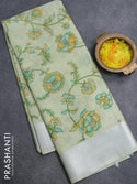 Tissue linen saree pista green with floral butta prints and zari woven border - {{ collection.title }} by Prashanti Sarees